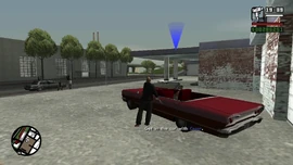 CJ and Cesar get in Cesar's car.