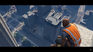 Construction workers resting on the edge of the Mile High Club construction site as a helicopter flies beneath them.