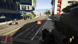 Destroying a police car with the Grenade Launcher.