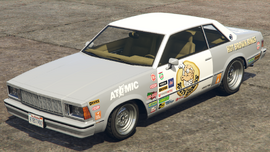 A Tulip M-100 with a Donut Time! livery in Grand Theft Auto Online. (Rear quarter view)