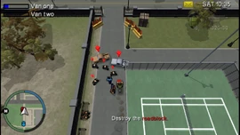 Using the explosive barrel to destroy the roadblock.