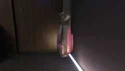 Franklin's clubs in a  golf bag in his  office