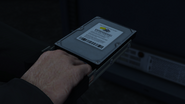 TheDataContract-GTAO-SS6.png (888 KB) Close-up of a hard drive.