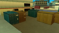 Small shipping containers on a freighter