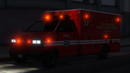 An Ambulance with lights and sirens activated. (Rear quarter view)