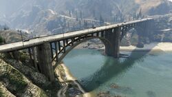 Cassidy Creek Bridge carries Route 1 over the mouth of Cassidy Creek at Raton Canyon.