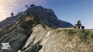 Trevor descending from Mount Chiliad on a Blazer.