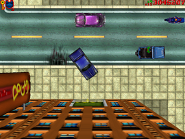 Delivering the bank robber and the getaway car to the garage in Central Banana Grove.