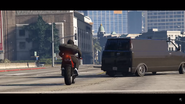 The Burrito pulls out in front of Solomun at a freeway exit.