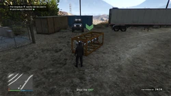 The Cargobob nearby can be used to lift and transport the EMP.