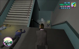 Tommy fighting his way out of the hotel after Shrub sent some officers after him.