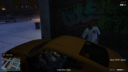 Entering the getaway vehicle previously stashed by the player.