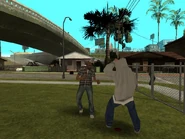 A crack dealer (in white sweatshirt) fighting a pedestrian at Grove Street.