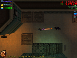 Going around the back of the lab and killing more guards.