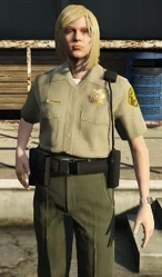 A blonde female sheriff deputy.
