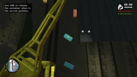 He places the second container.