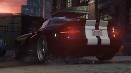 BansheeGTS-GTAOe-AgentsOfSabotageTrailer.png (1.05 MB) Rear of the Banshee GTS as seen in the trailer for Agents of Sabotage.