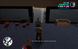 Tommy sets the timer for five seconds and tells Lance that they need to get clear of the area quickly.