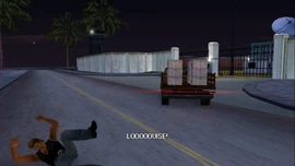 He acts as a decoy, driving his truck into the army base's gates.