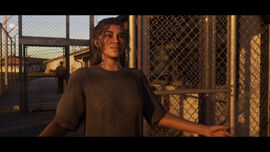 Lucia being released through the front of the prison.