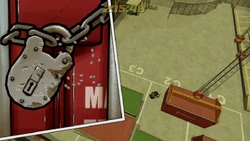 Breaking the padlock of a shipping container to open it