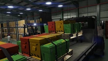 LosSantosDrugWars-GTAOe-TrailerScreenshots-Forklift.png (6.83 MB) GTA Online Protagonist using a Forklift to steal equipment for the Acid Lab.