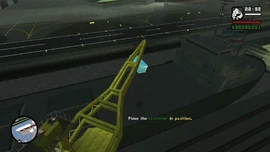 He must place the container in position.