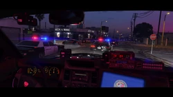 A high-speed police chase, involving the Greenwood Cruiser, a , and an . The police cars are pursuing a , a . and a 