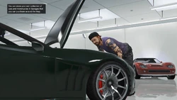 Opening GTA Online cutscene showing a mechanic in a 10-car garage.