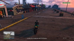 Locate the employee with the laptop