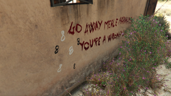 Graffiti on the north wall of his house.