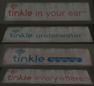 The various slogans displayed on the Tinkle store front in Alderney City.