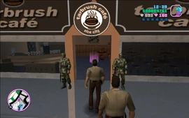 Tommy walking into the cafe.