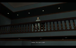 Cam tells Tommy that the vault is open and that he has the money from the balcony above.