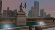 The statue and square close to the nearby subway station, with Staunton island in view, GTA III.