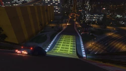 The racers proceed towards the start/finish line