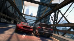 A  speeds through busy traffic on the Broker Bridge