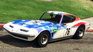 A Coquette Classic with a Murican Made livery which features Jock's name and emblems on it in Grand Theft Auto Online. (Rear quarter view)