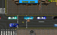 Robbing a car in the gameplay.