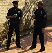Two LSPD police officers drinking Bean Machine.
