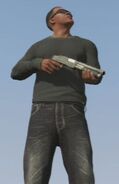 Franklin holding the Sawed-Off Shotgun.