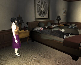 Isaac sleeping while his girlfriend watches over him.