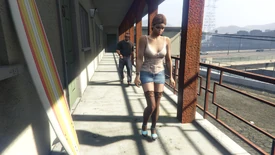 Leaving the motel room with a prostitute.