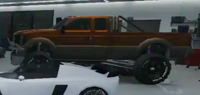 A crew cab variant with modifications seen in the player's garage in GTA Online.