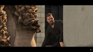 Following the Dubsta, Solomun hides behind a wall, watching.