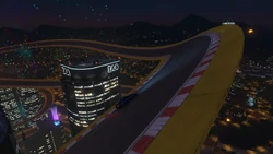 The track bends and goes near the top of the IAA building