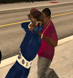 An Elvis Impostor about to have his throat slit by Carl Johnson with a knife.