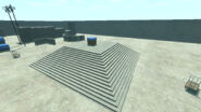 A staircase with a crate in the middle.