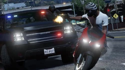 An FIB giving chase to a  riding a 