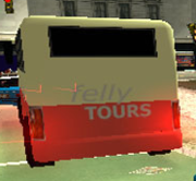 Back end of a Coach with the name Felly Tours on it.